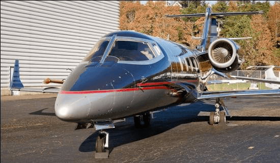 Learjet 60 LV-CPL parked outside a hangar, from the supplied Matrix Aviation photo pack